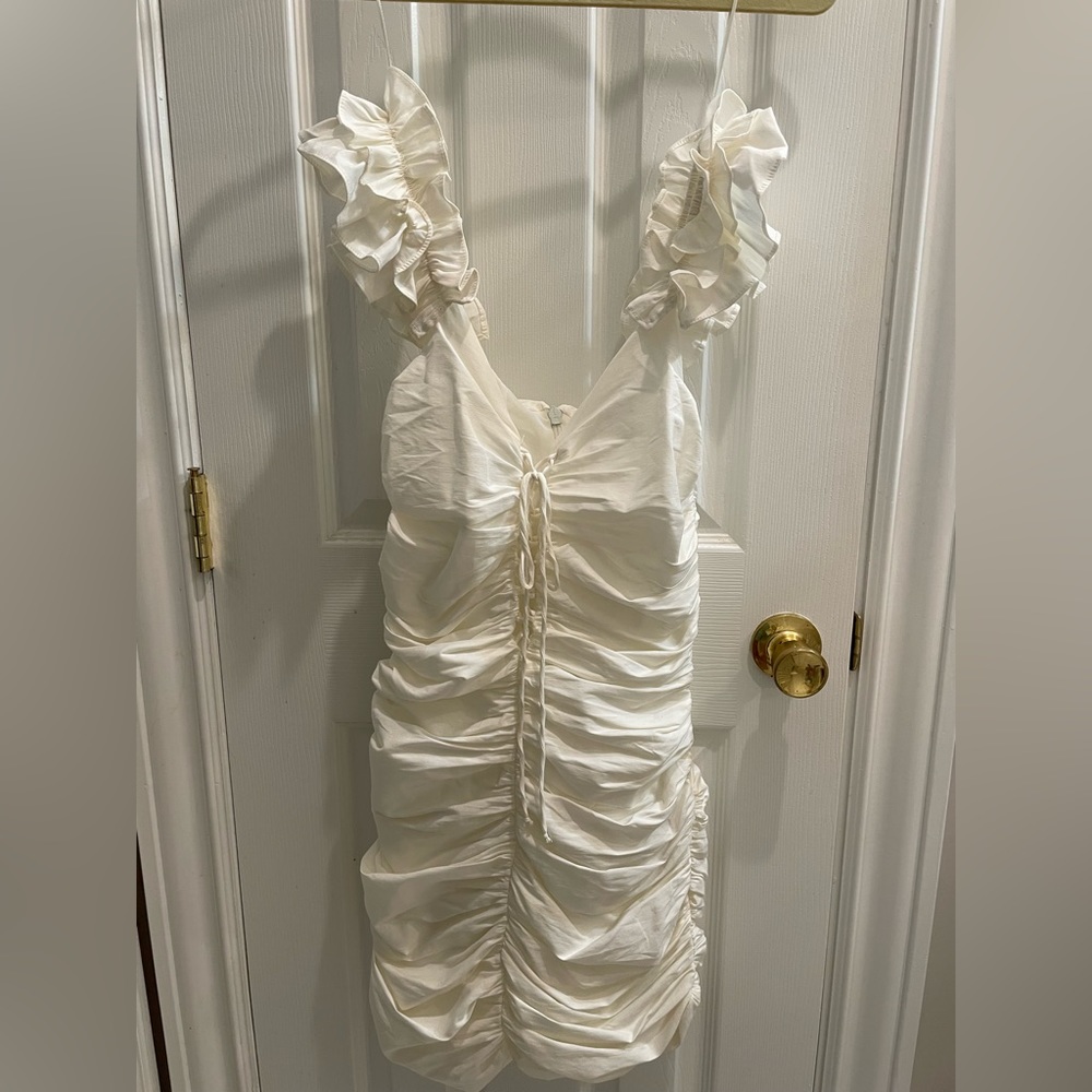 White ruffle mini dress
